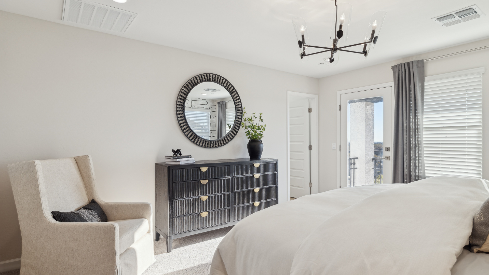 Primary bedroom designed with privacy and comfort in mind, flowing into spa-inspired ensuite and walk-in closet
