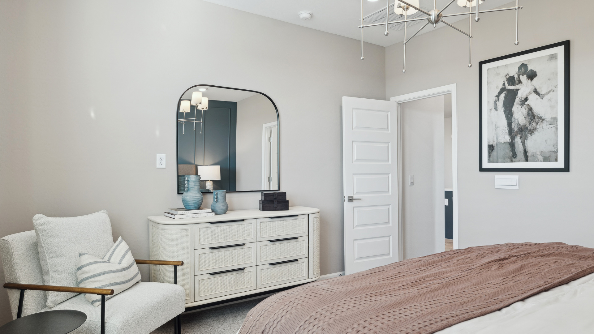Primary bedroom with walk-in closet.