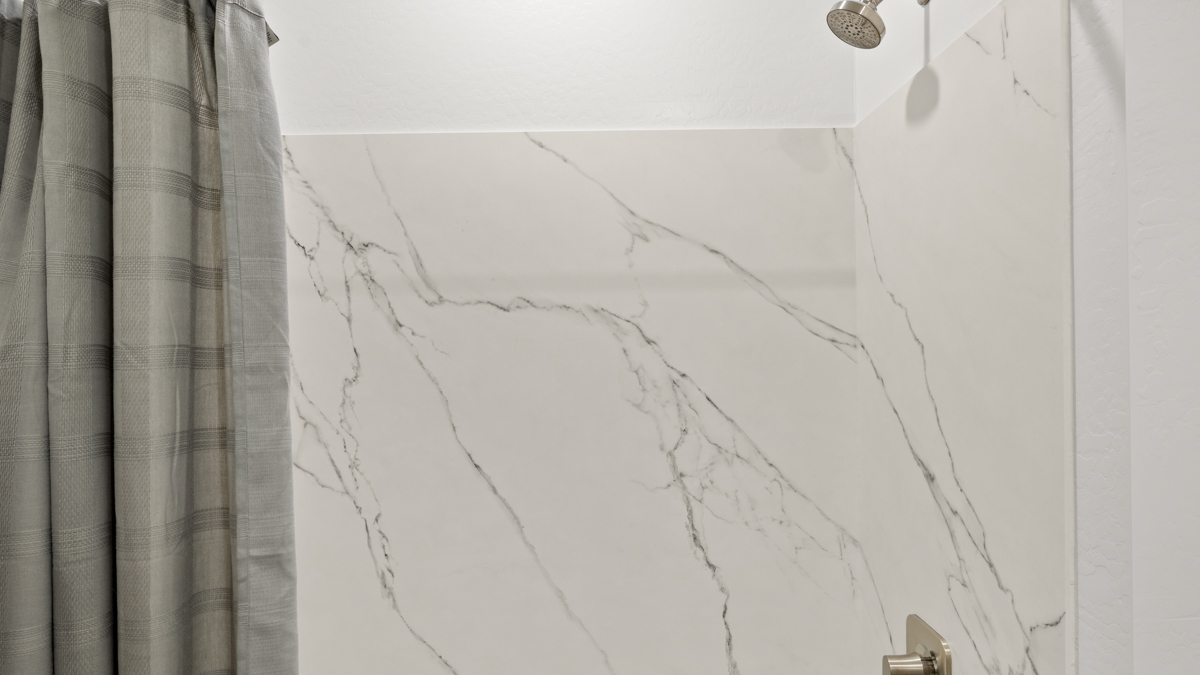 guest bathroom with bathtub