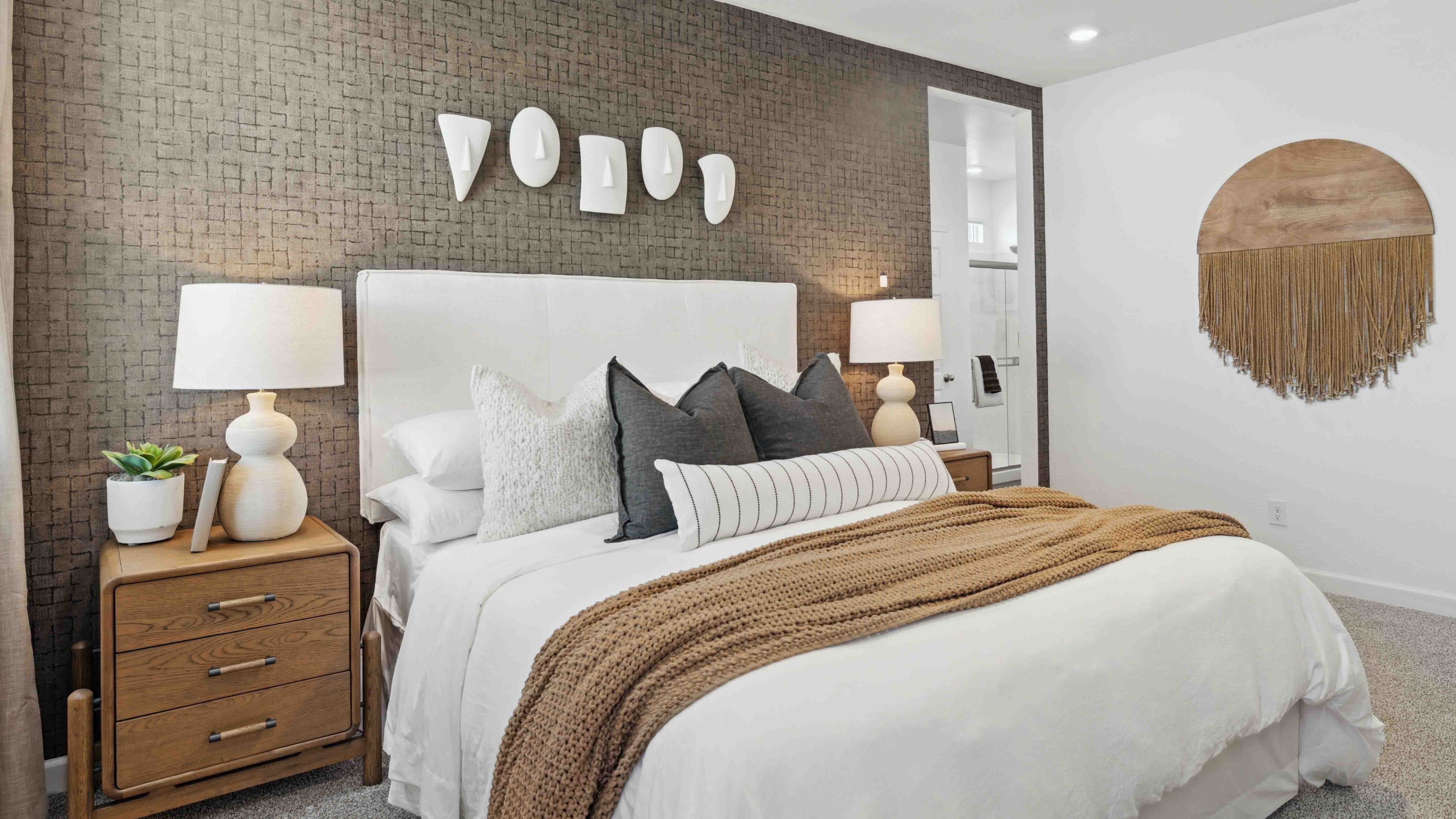 primary suite with walk in closet