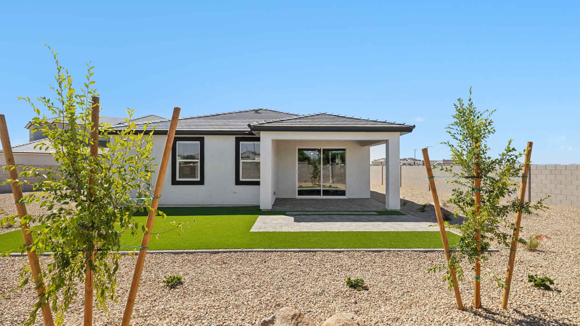 covered patio and backyard for entertaining