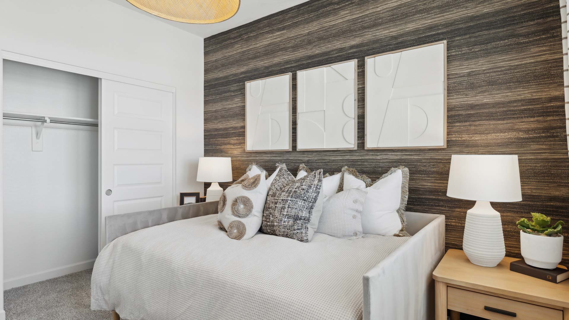 Guest bedroom with large closet space.