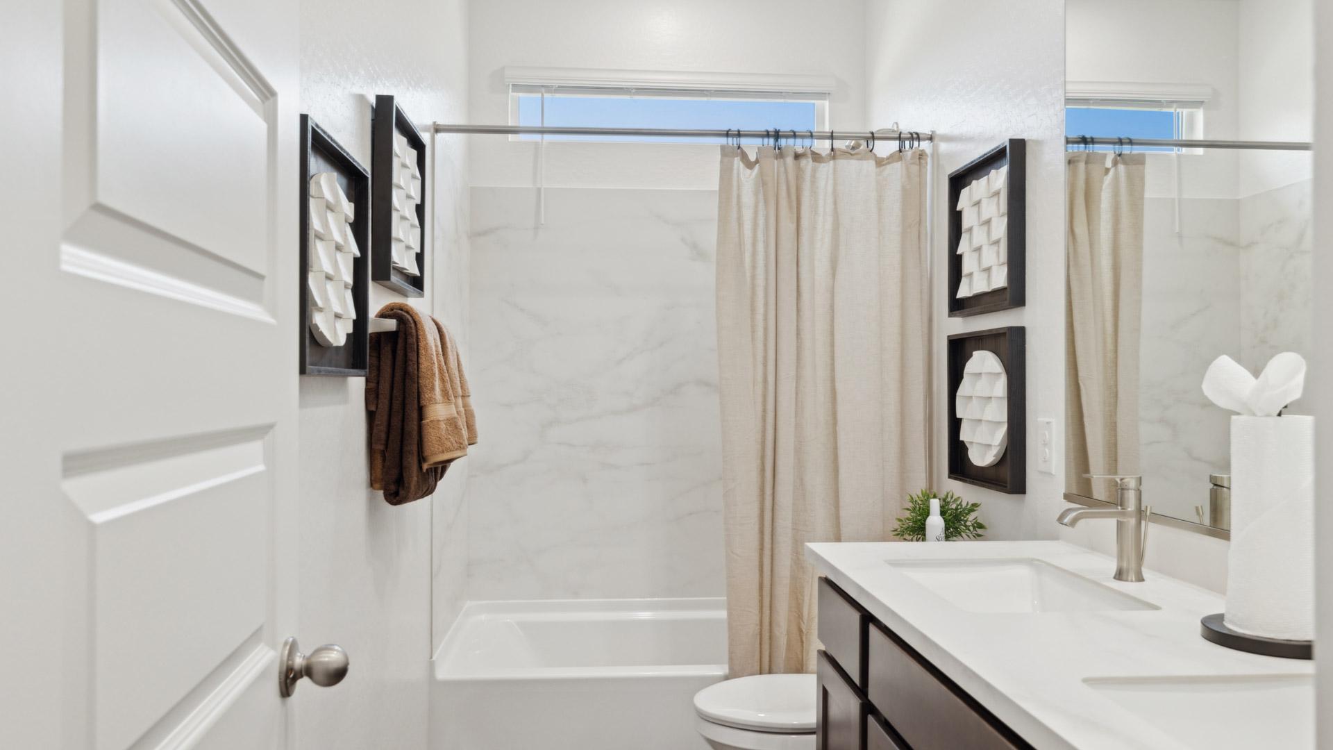 Second bathroom with bathtub.