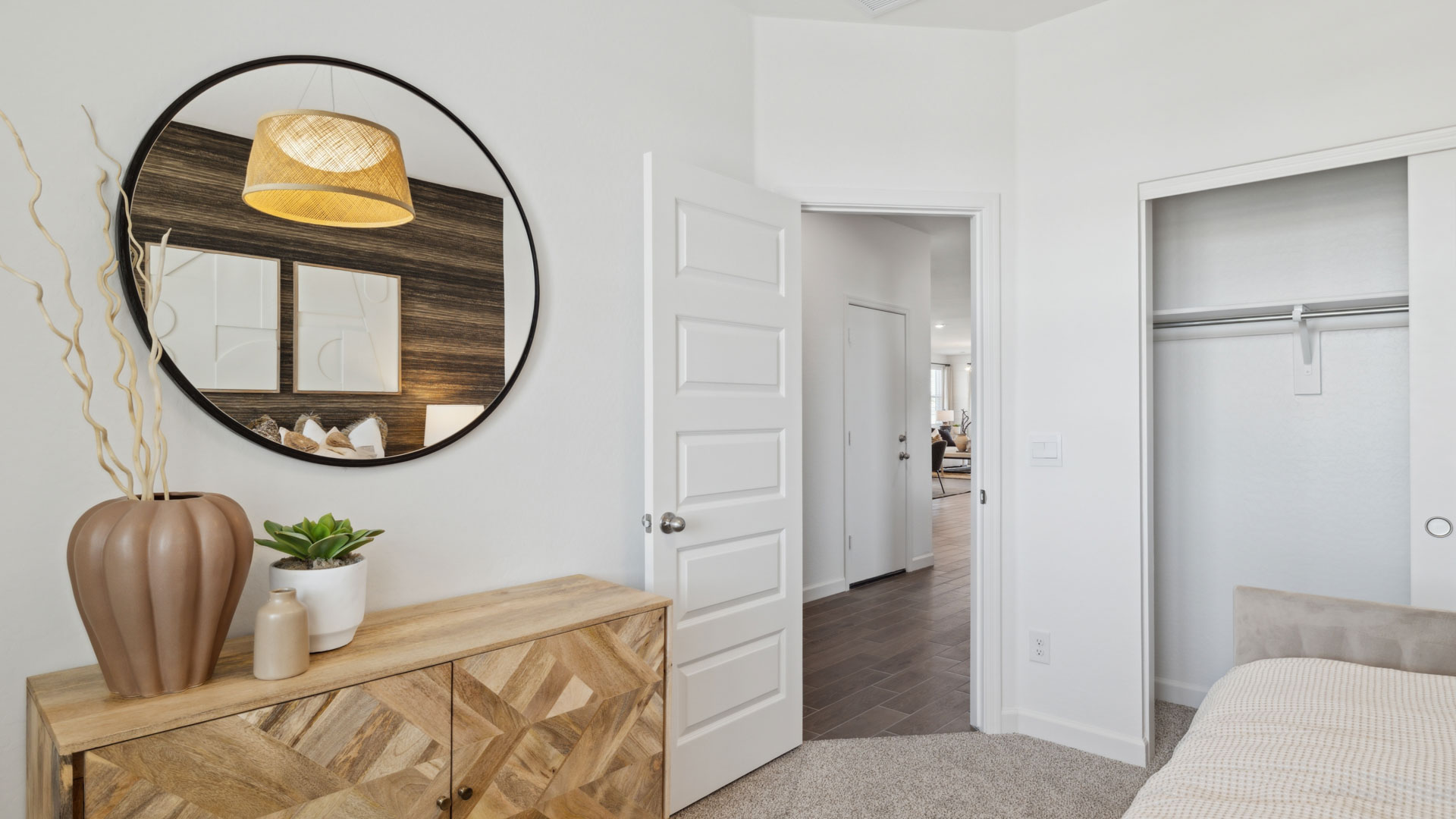 Guest bedroom with large closet space.