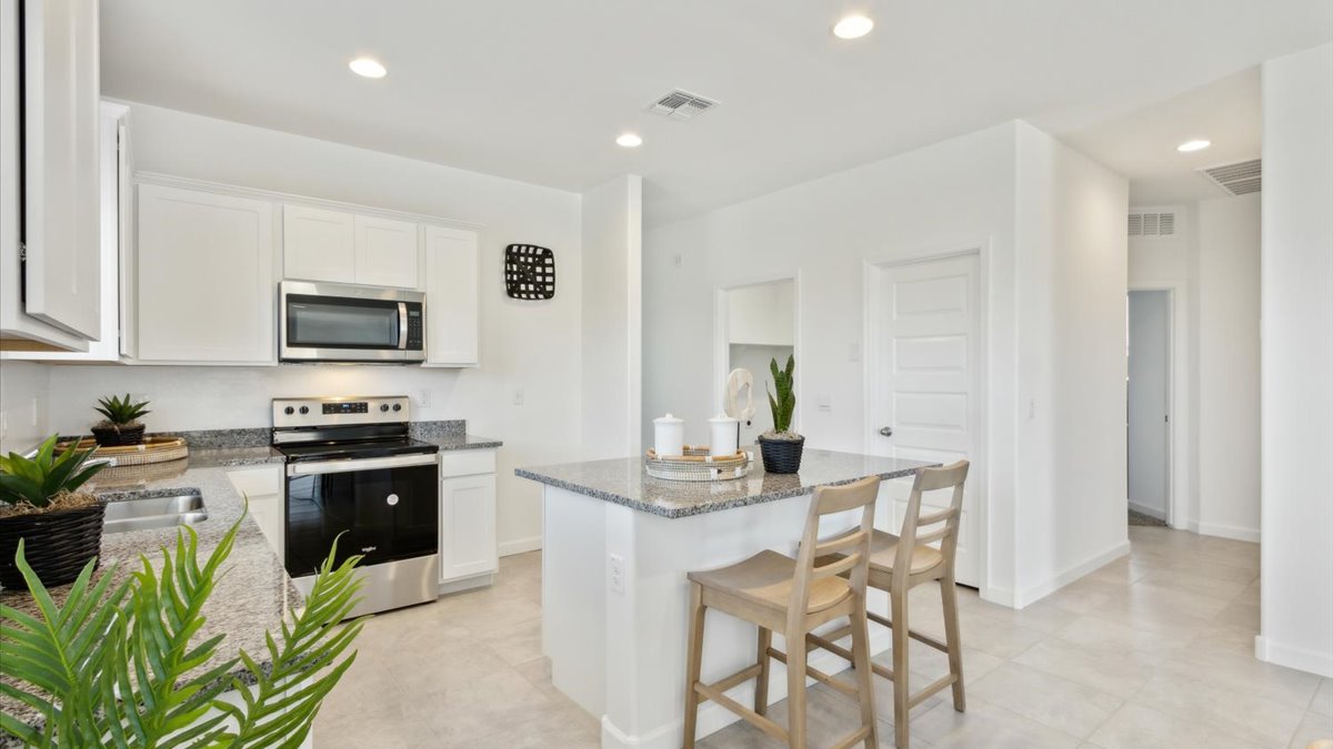 kitchen with large island and walk in closet