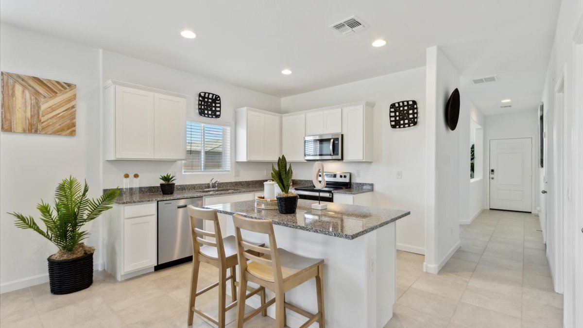 kitchen with large island and walk in closet