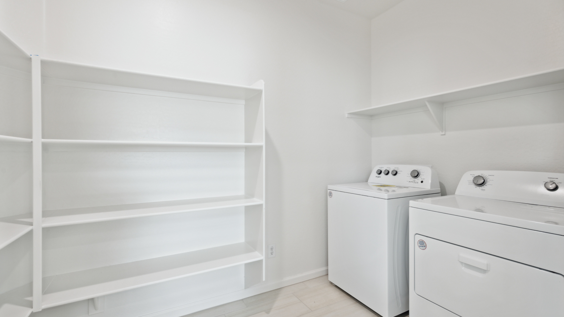 laundry room with shelving
