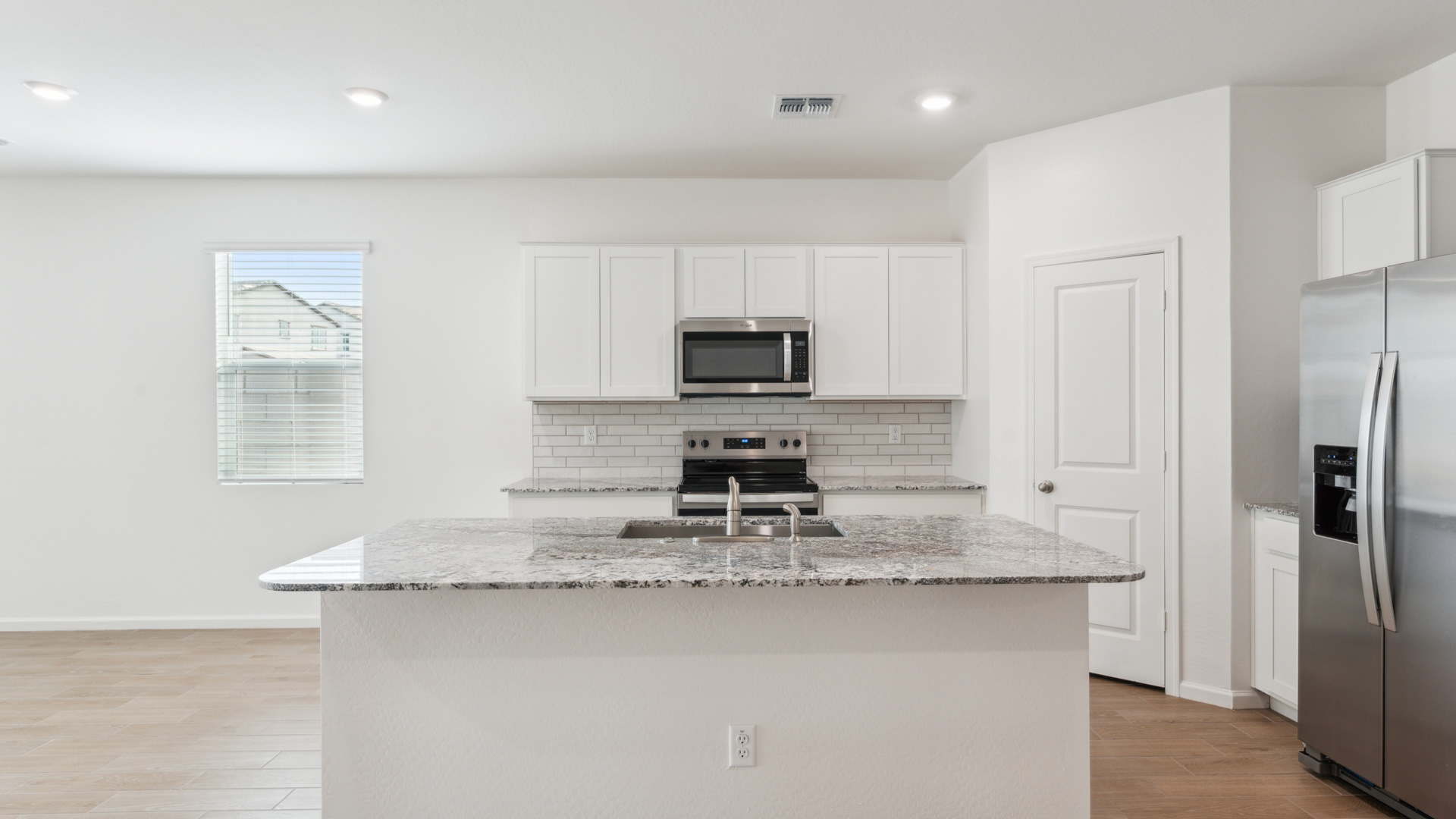 Spacious dining area that connects with the living and living room.