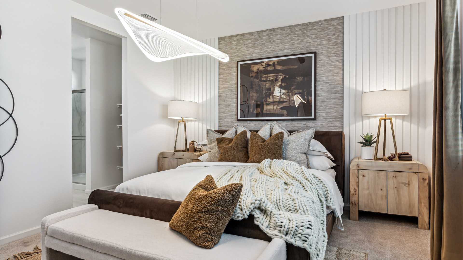 Spacious primary bedroom with walk-in closet.