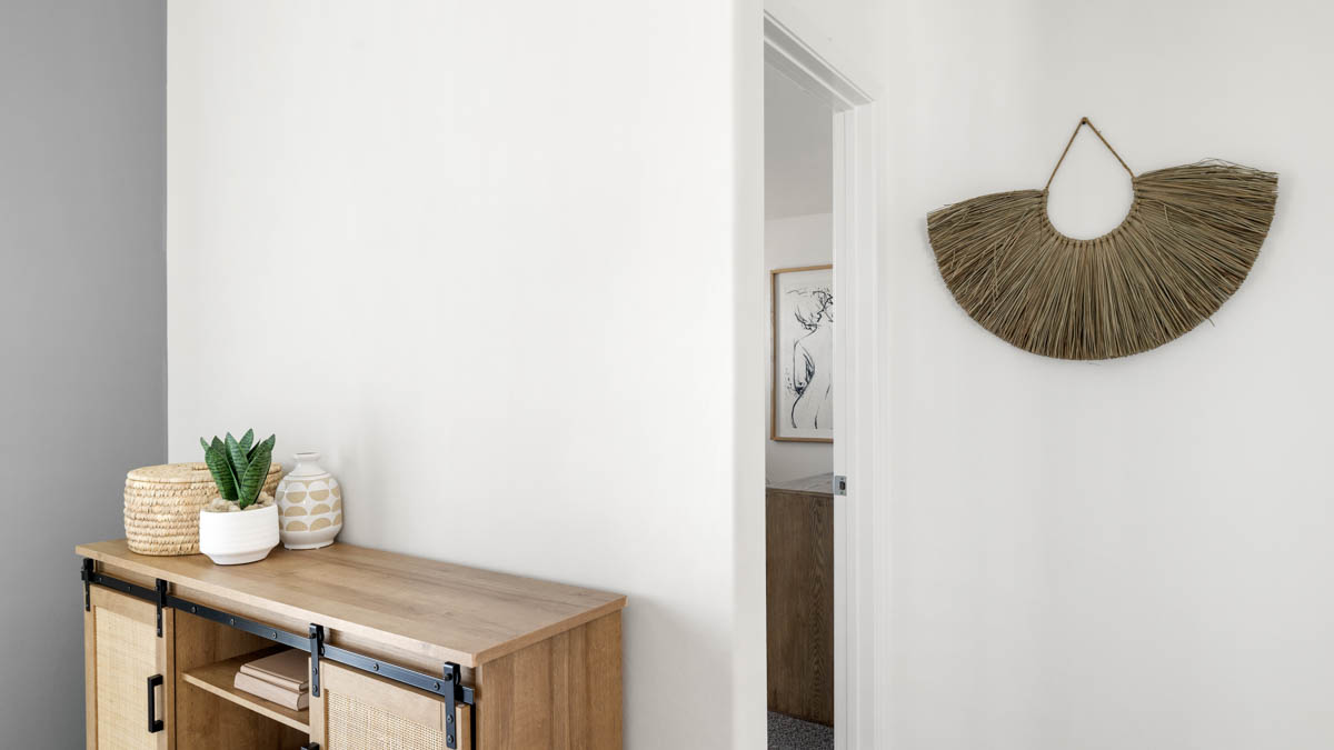 Private hallway into primary bedspace.