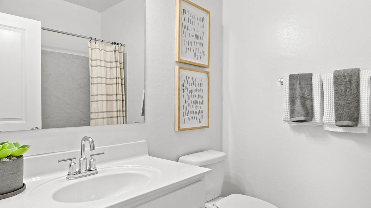 Second bathroom with a bathtub.