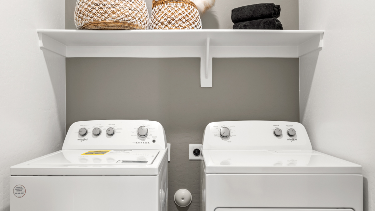 laundry room with shelving
