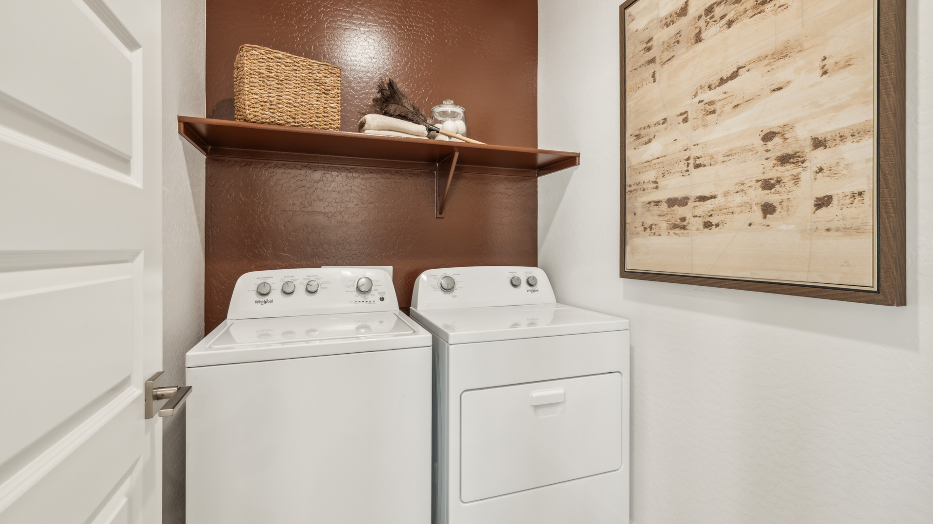 Laundry room with shelving.