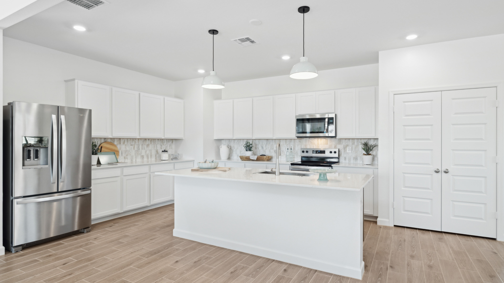 Large kitchen with an island.