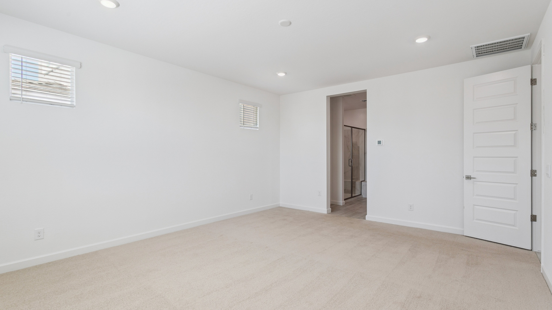 primary suite with walk in closet
