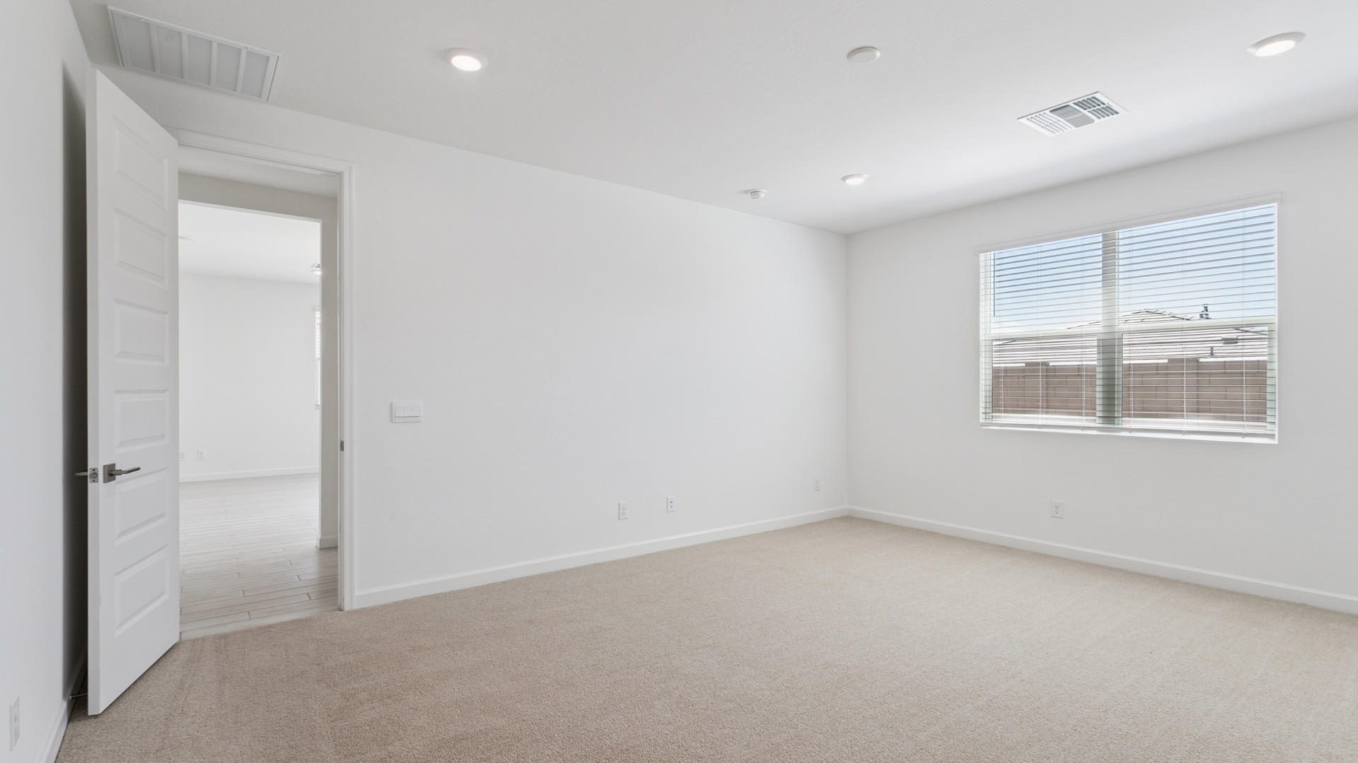 primary suite with walk in closet