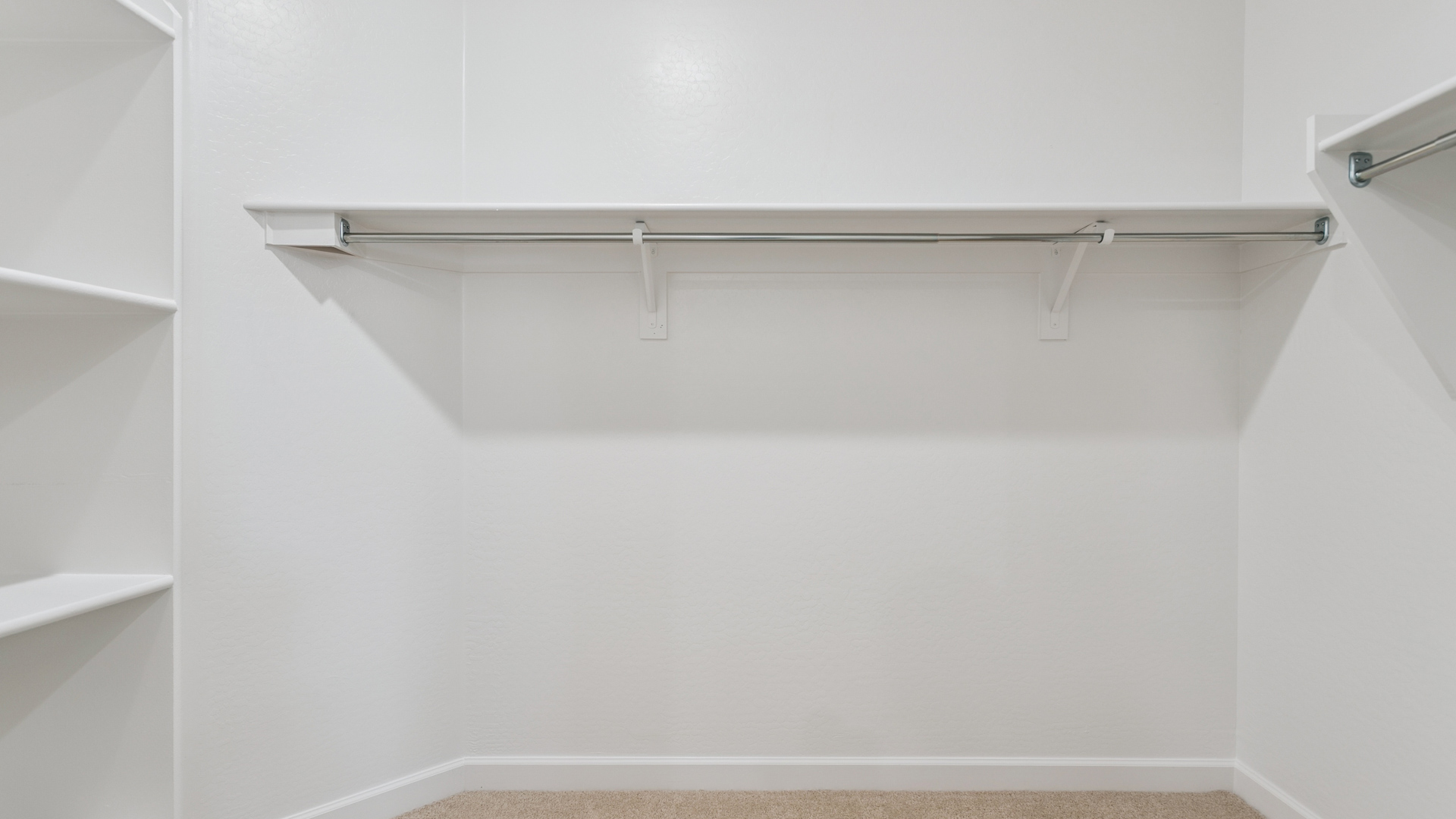 primary suite with walk in closet
