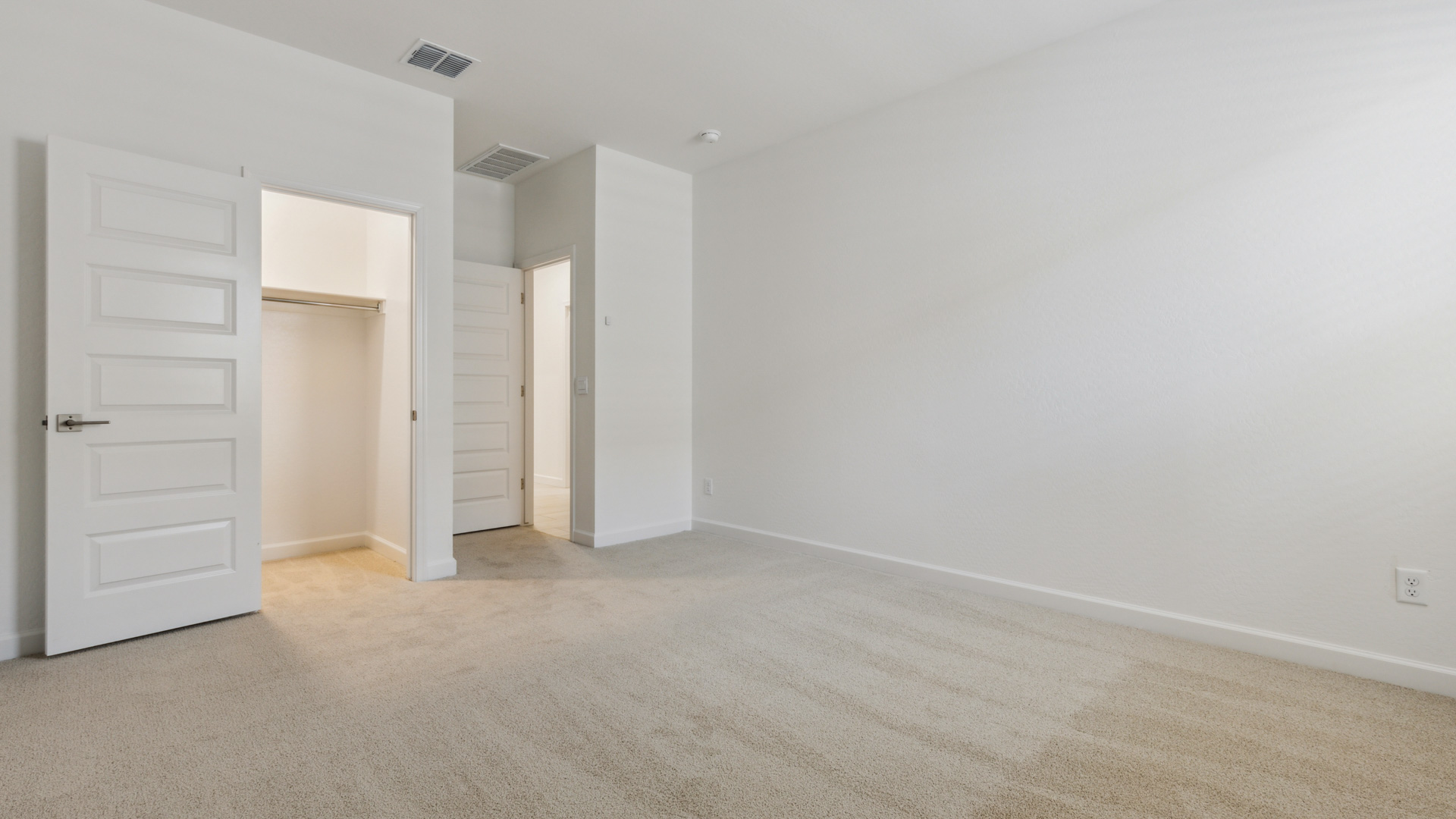 guest bedroom with large closet