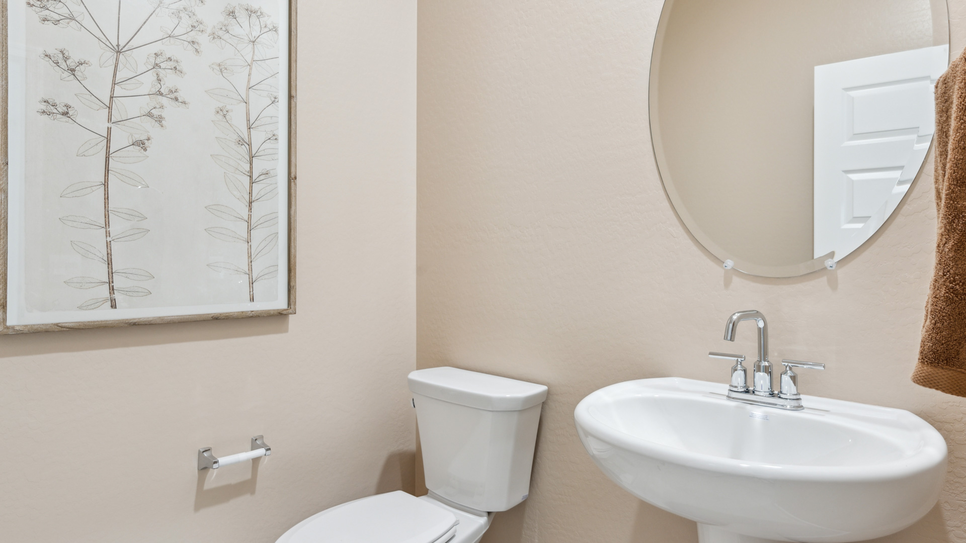 A well-designed half-bathroom for guests.