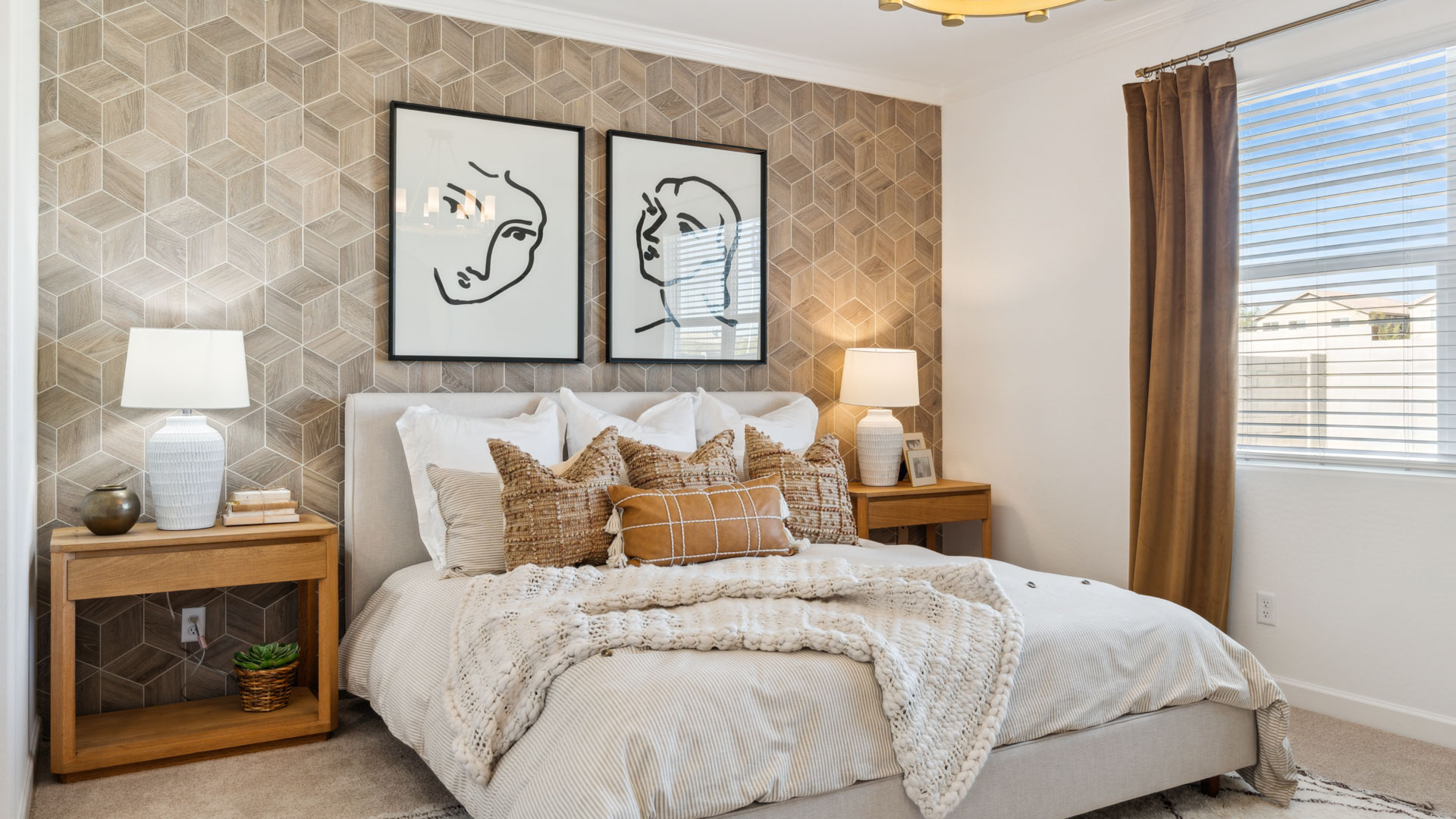 Primary bedroom with plush carpeting and a large walk-in closet.