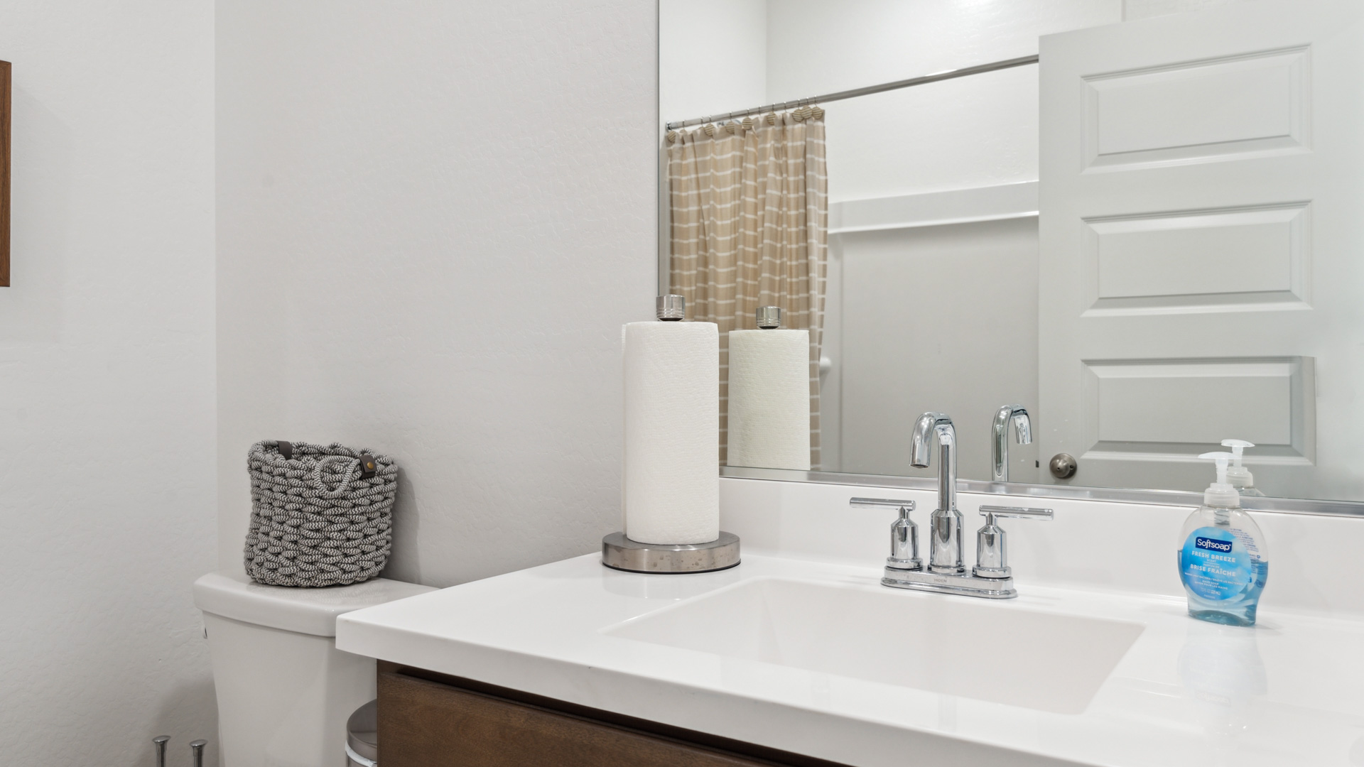 A well-designed half-bathroom for guests.