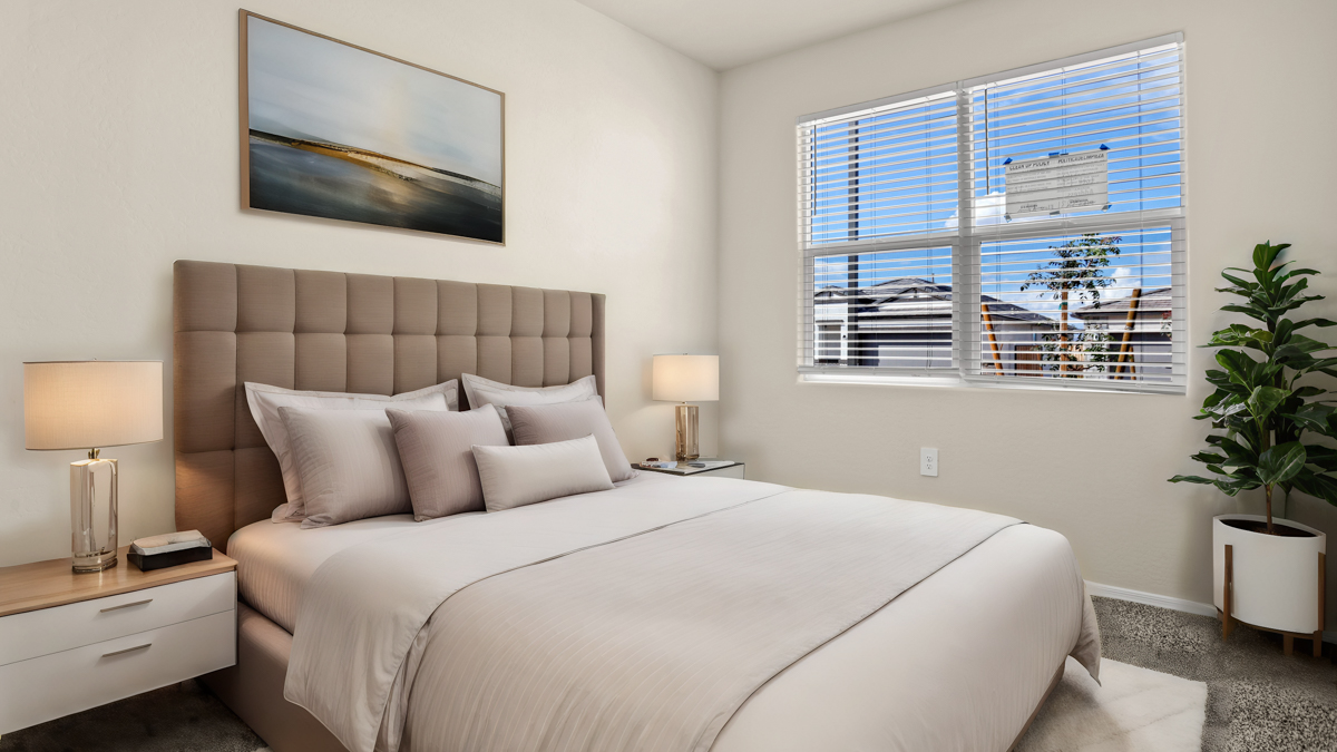 Staged guest bedroom.