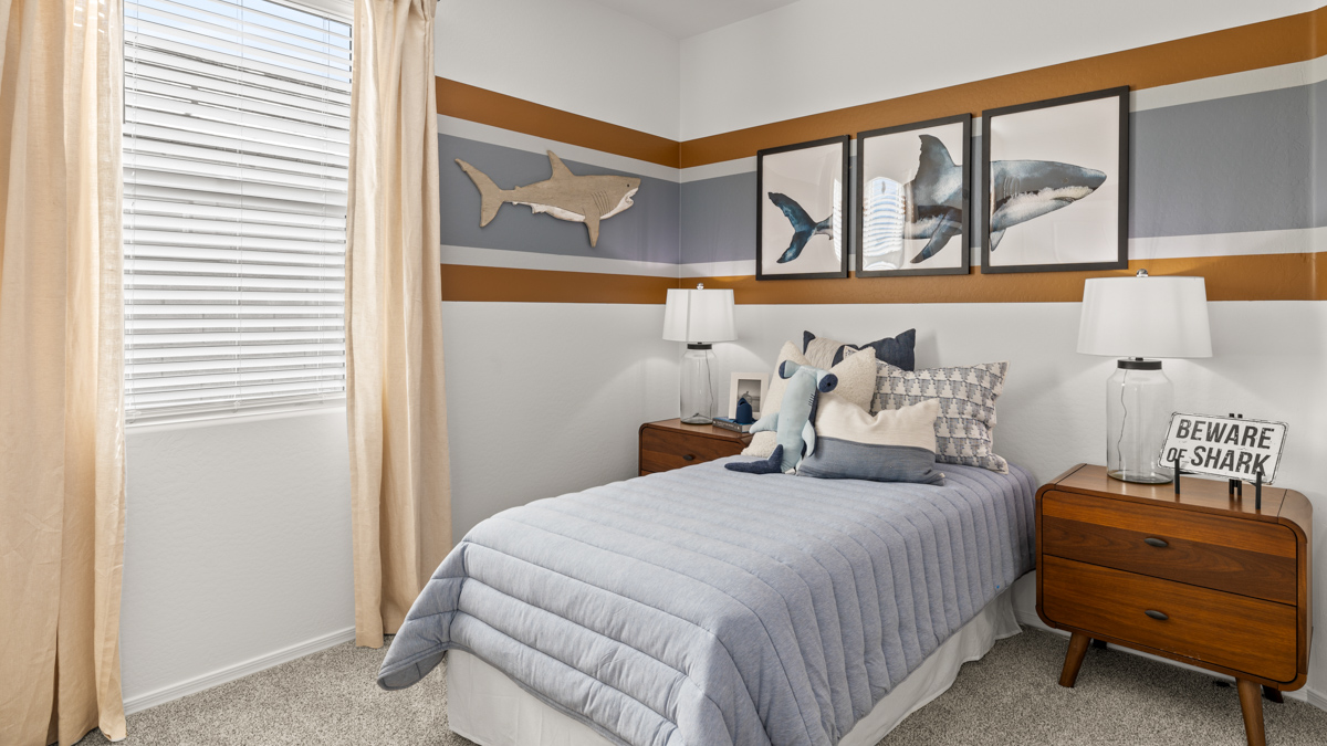 Vibrant kid's room with a large closet.