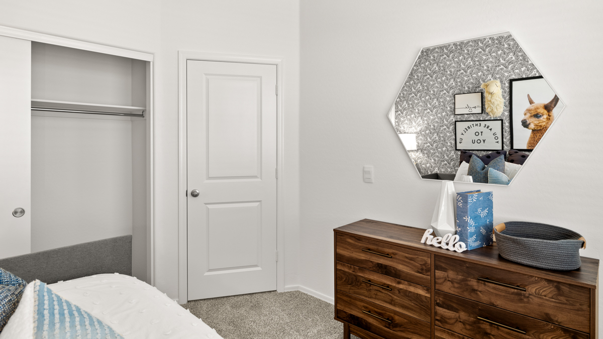 Vibrant kid's room with a large closet.