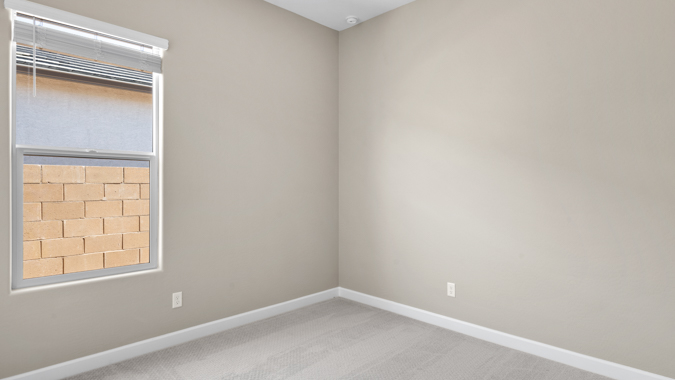 Kid's bedroom with large closet space.