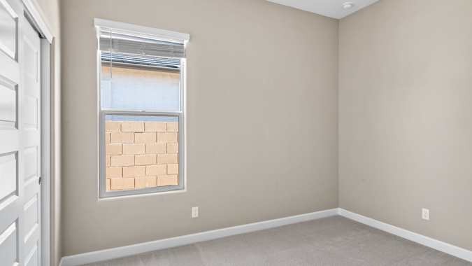 Guest bedroom with large closet.
