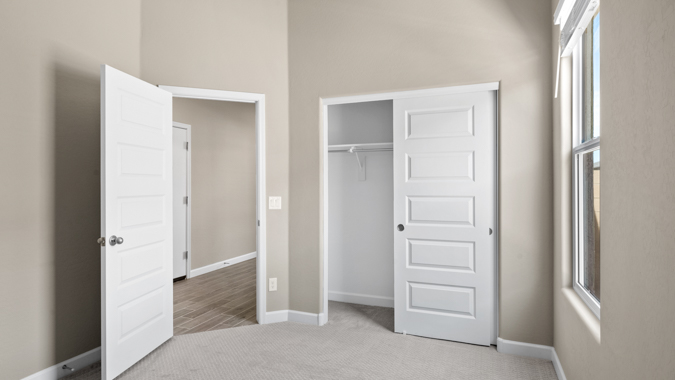 Guest bedroom with large closet.