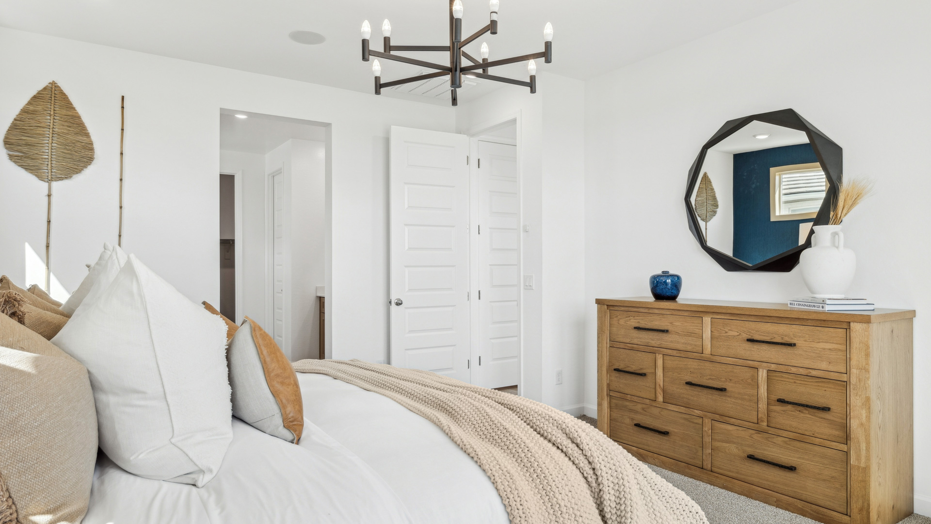 primary suite with walk in closet