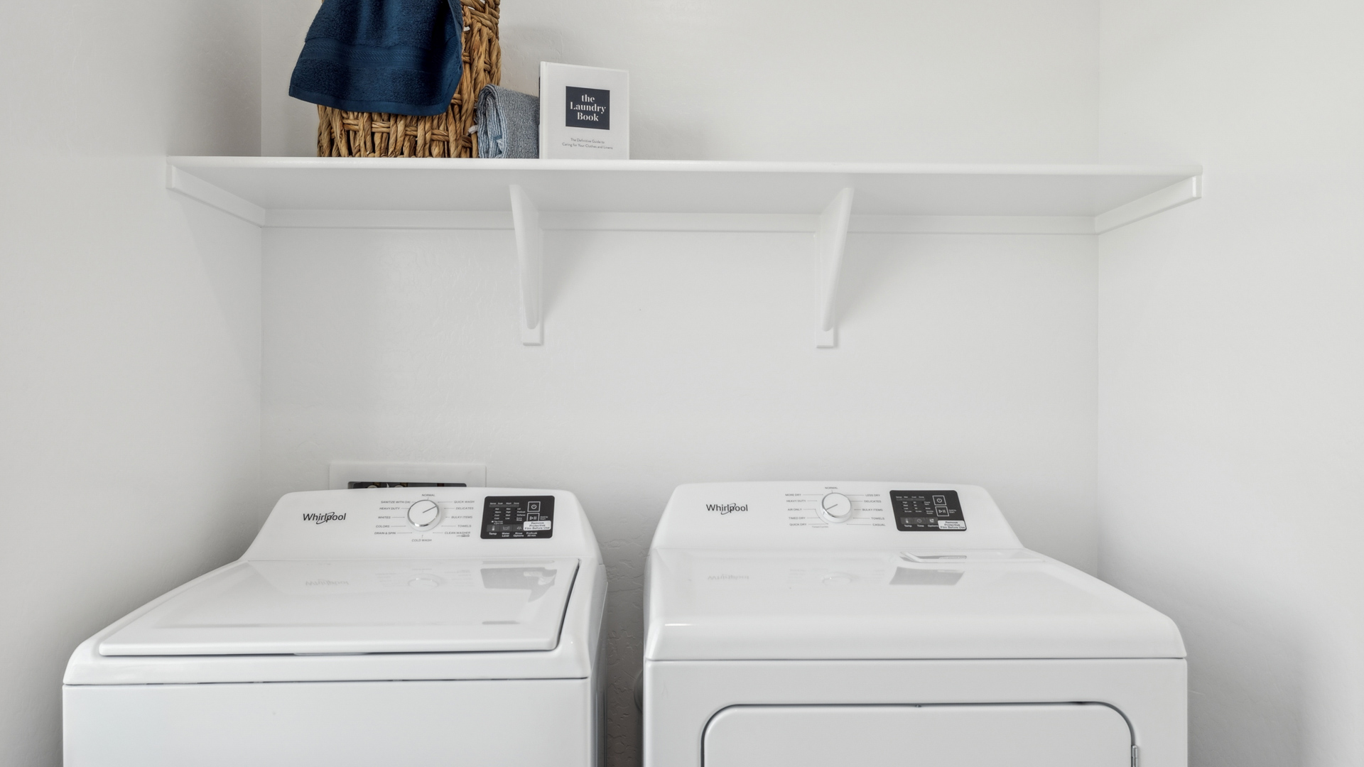 laundry room with shelving