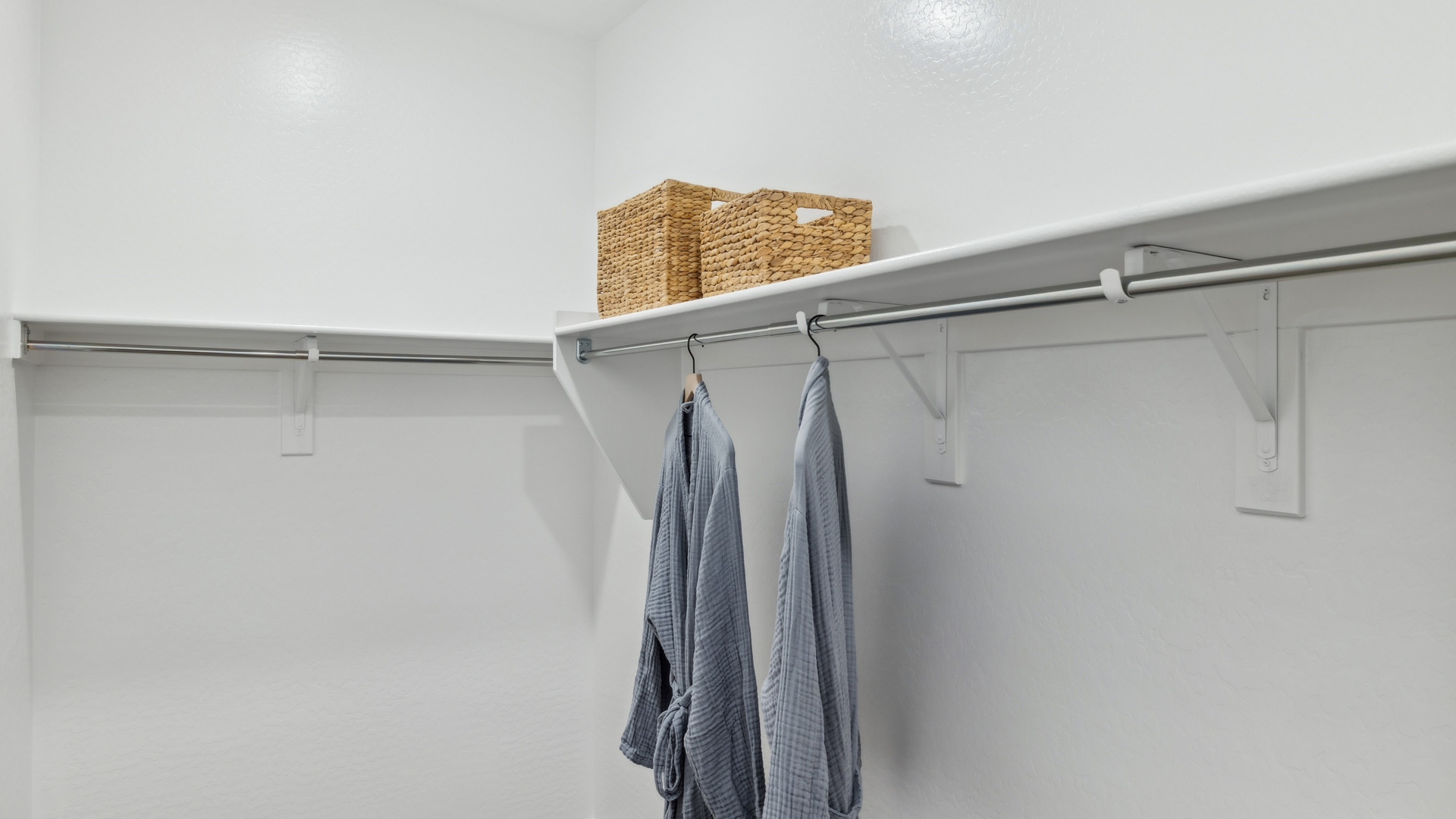 primary suite with walk in closet