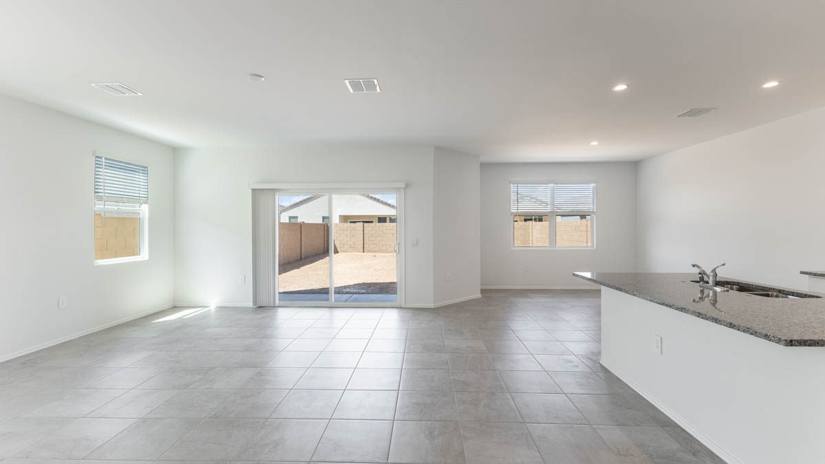Yosemite great room with sliding glass door to the backyard a