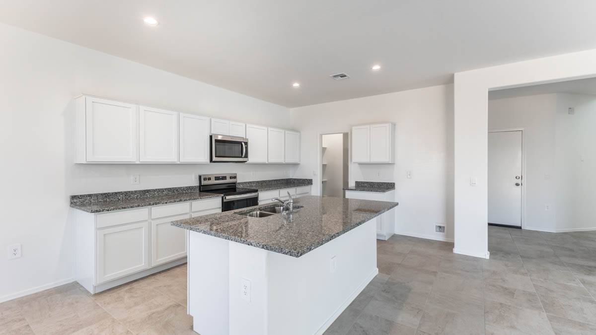 Yosemite kitchen with white cabinets and corner pantry