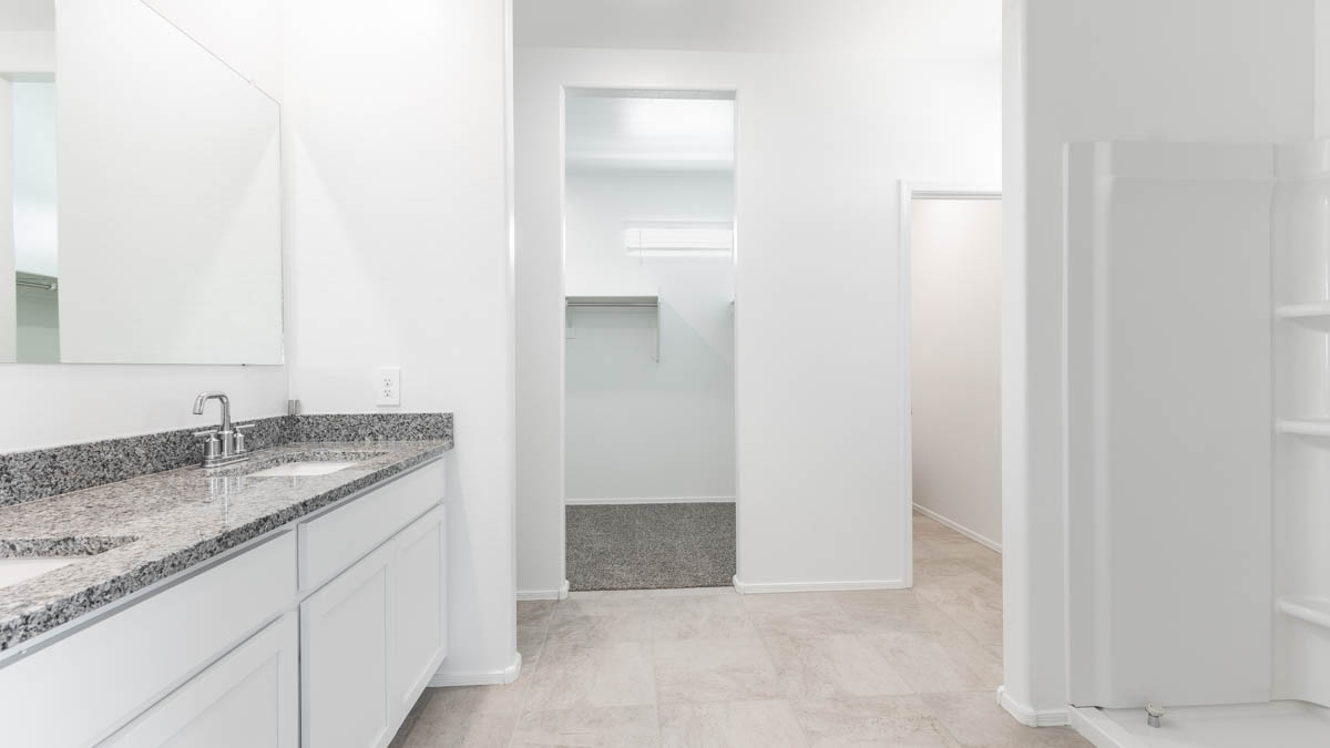 Yosemite bathroom with white cabinets and storage