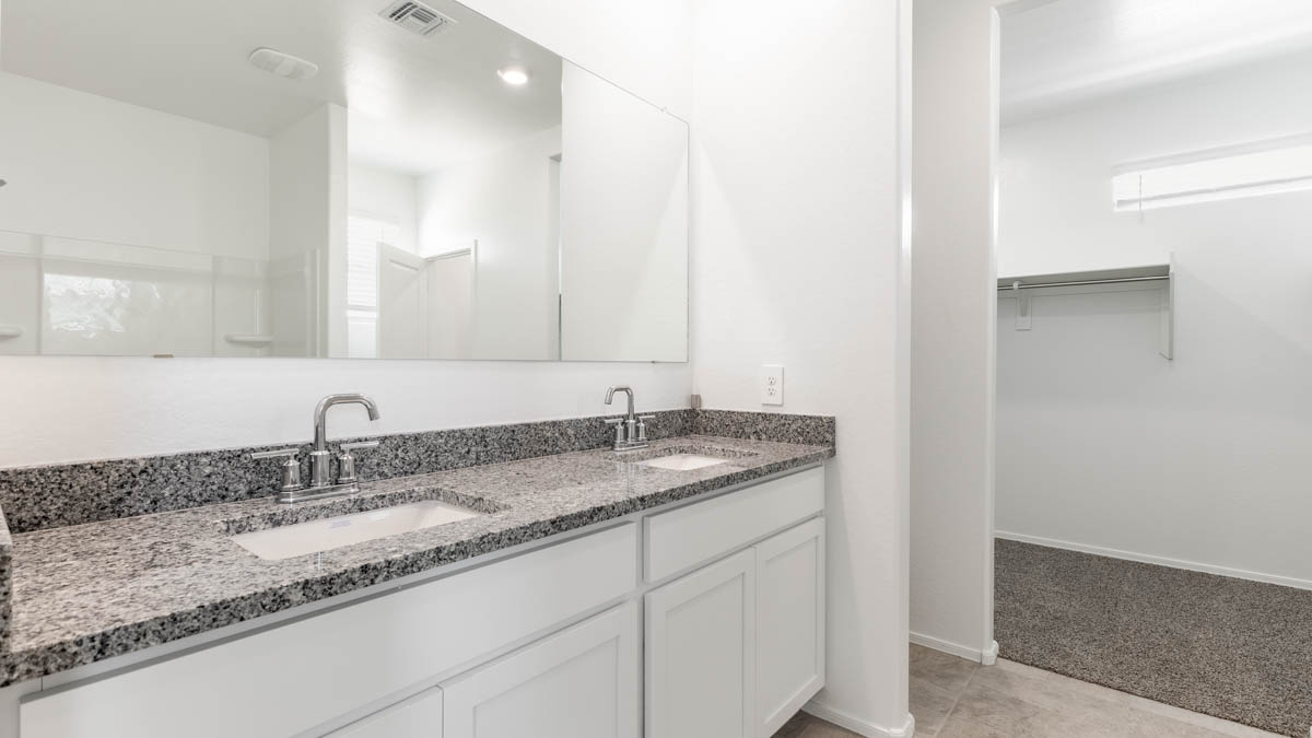 Yosemite bathroom with white cabinets