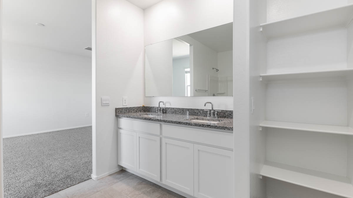 Yosemite bathroom with storage and white cabinets