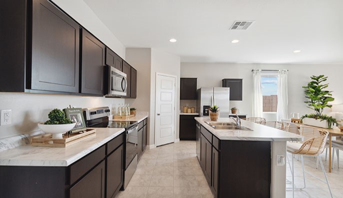 Gaven kitchen with brown cabinets