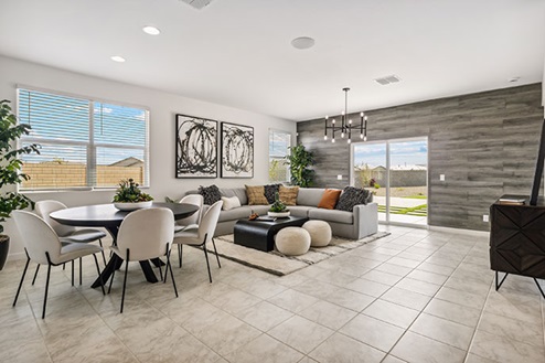 Dining area with large table connecting to the living room.