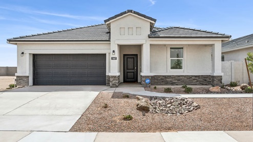 Heartland Ranch, Coolidge AZ, Presented By D.R. Horton, 1-Story Stucco 2 car garage new home Creme Color with Dark Stone trim accents