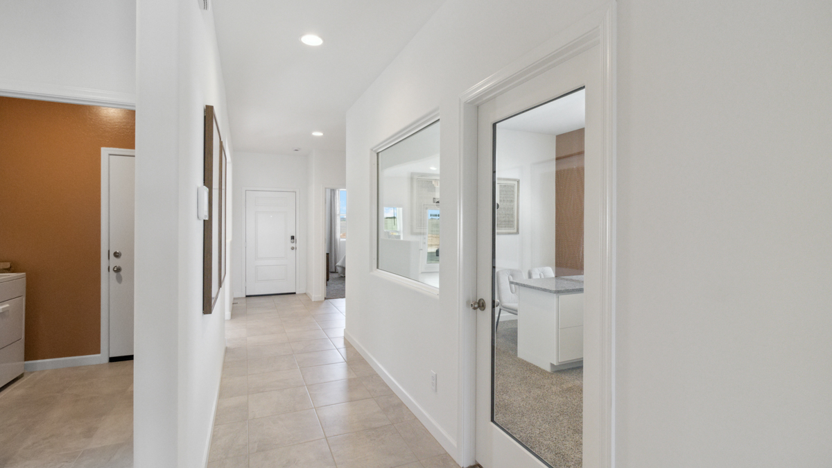 View of foyer and front flex-office room near the main entry corridor Heartland Ranch