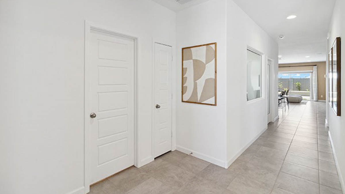 A foyer, entry hall inside front door, next to office, or sitting room adding a welcoming front, direct line of sight home