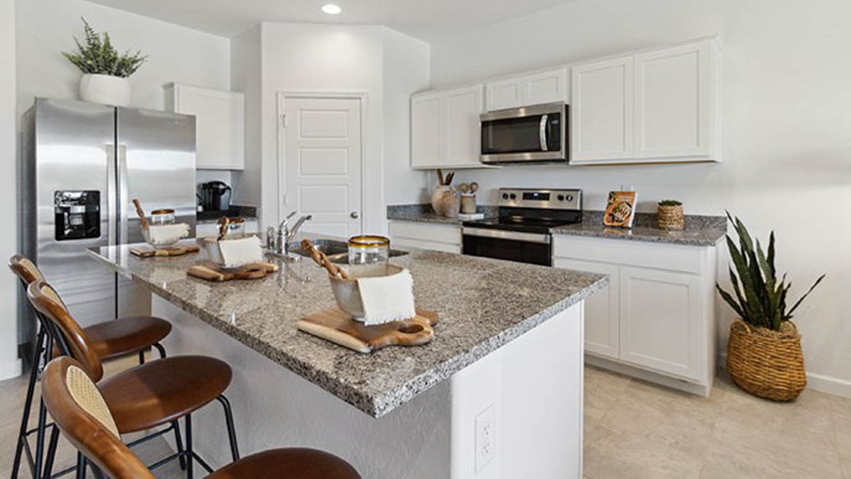 New appliance suite included in our larger kitchen island area view with seating anchor our kitchen, near dining, great rooms