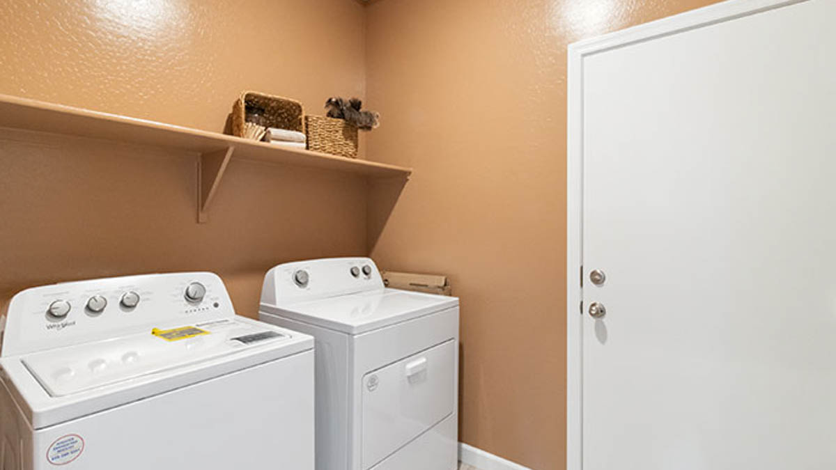 Sorrento in Maricopa utility laundry smartly designed with overhead organized storage, a drop zone, with new washer, dryer included