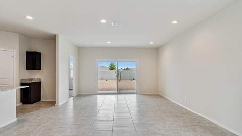 Camden great room with sliding glass door to the backyard