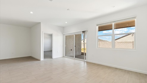 Justin great room and sliding glass door to the backyard
