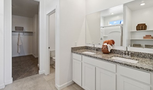 harris bathroom with white cabinets