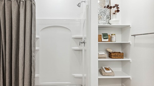 Primary bath with a step in shower